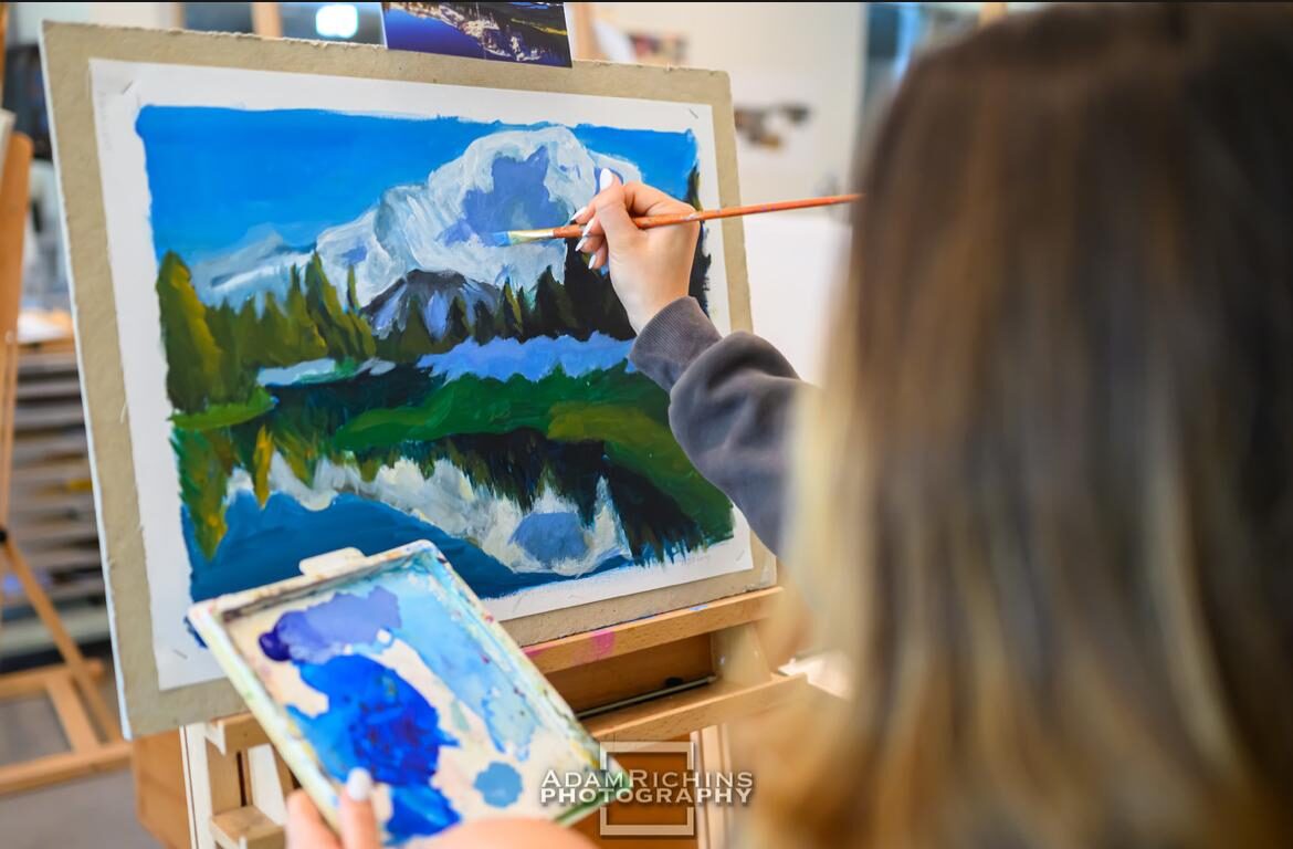 Ayala Levy painting in the studio